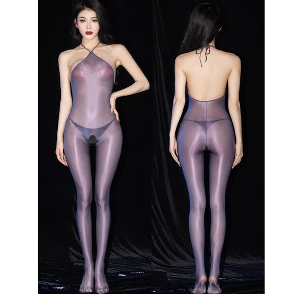 A woman posing in a gray glossy sheer bodystocking featuring a halter neck, closed feet, and an open crotch.