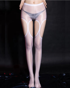 A woman wearing white glossy suspender pantyhose and panties.
