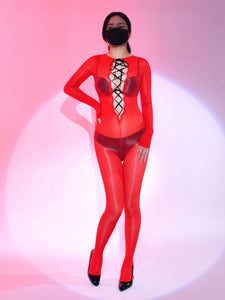 A woman posing in red long sleeves sheer glossy bodystocking, with front and back criss cross strappy detailing, with black high heels.