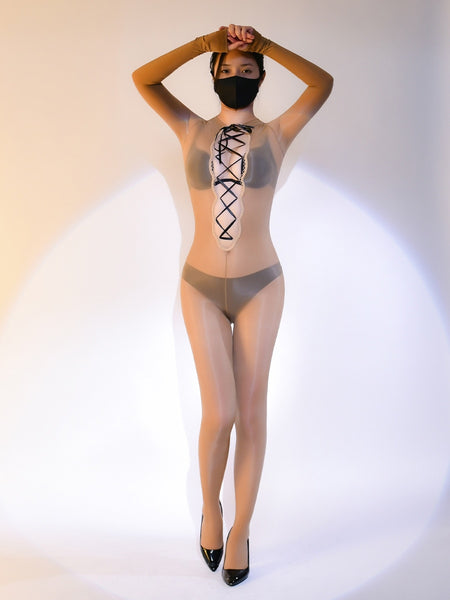 A woman posing in brown long sleeves sheer glossy bodystocking, with front and back criss cross strappy detailing, with black high heels.