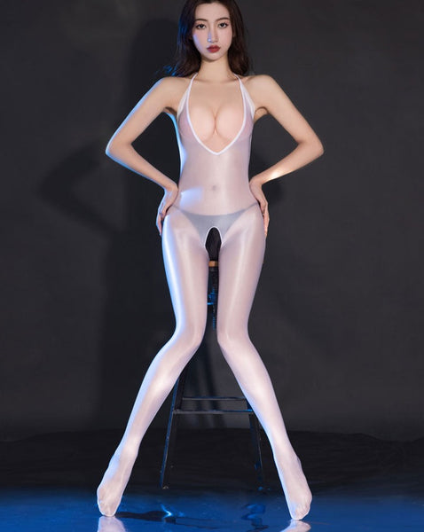 Front view of lady wearing a white shiny bodystocking with a deep v neckline, halter neck, and an open crotch. 