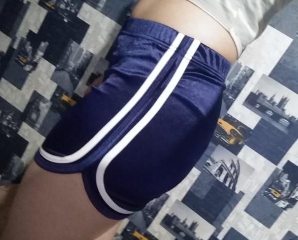 Blue silky high waisted booty shorts featuring a elastic waistband, white edging line that accentuate your butt, comfortable and stretchy. 
