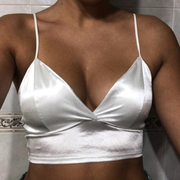 white satin bralette featuring a soft cups, spaghetti straps and plunging V-neckline, hook and eye closure.