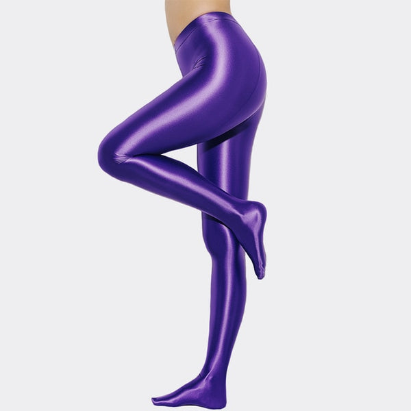Purple opaque shiny pantyhose legging with elastic waist band and a high waisted silhouette