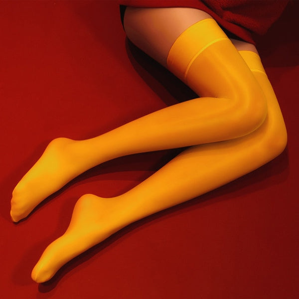 Yellow 8 denier sheer shiny thigh high stockings with solid leg band