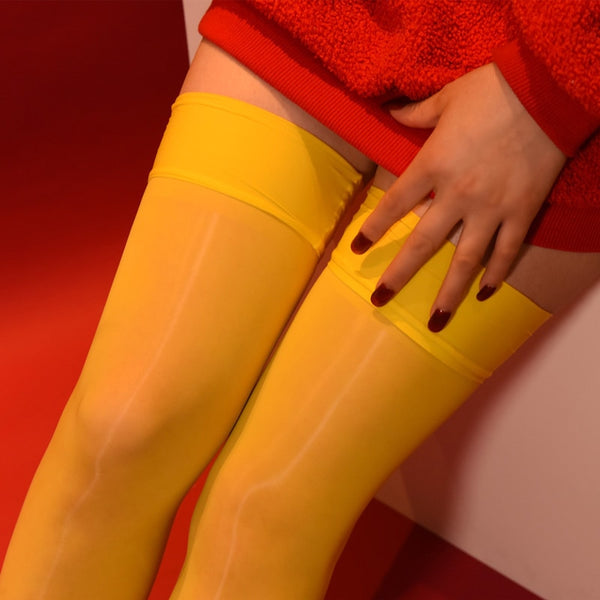 Yellow 8 denier sheer shiny thigh high stockings with solid leg band