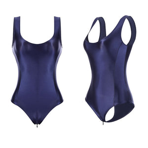 photos of blue color wet look bodysuit feauring a scoop neckline, thick shoulder straps, a zipper closure crotch and a cheeky cut back. 
