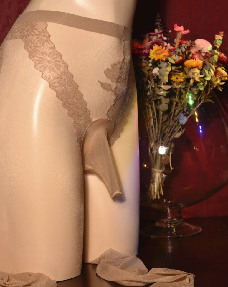 Front view of beige men's sheer pantyhose with floral lace panty section and nylon penis sheath.