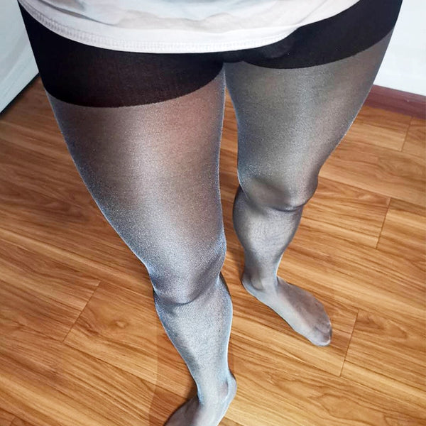 Front view of men's specific black sheer pantyhose with an penis pouch.