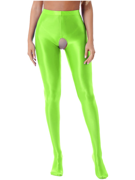 Front view of lady wearing wet look lumi green pantyhose with an open crotch.