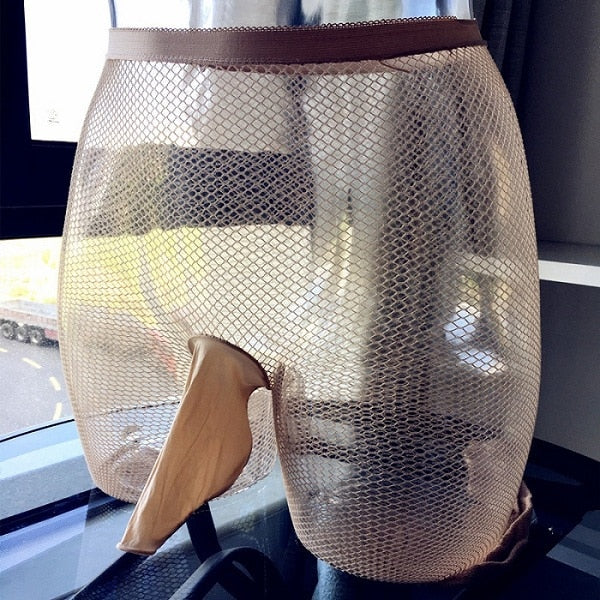 beige fishnet mantyhose featuring a penis sheath (option of closed of open tip)